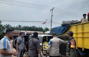 Polsek air kumbang Sukses Distribusikan 10 Ton Beras Murah