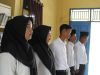 Plt Camat Karang Agung Ilir Hadiri Pelantikan Perangkat Desa Mekar Sari