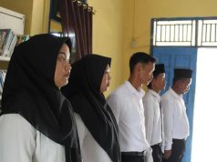 Plt Camat Karang Agung Ilir Hadiri Pelantikan Perangkat Desa Mekar Sari